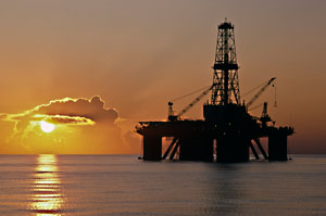 Oil rig at sunset