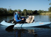 Guy on canoe along Little Manatee River
