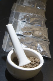Soil samples in mortar and plastic bags