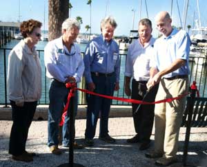 A ceremonial ribbon-cutting marked the reopening of the Tampa Bay Aquatic Preserves field office. From left: Suzanne Cooper, Gary Lytton, Roger Wilson, Randy Runnels, and Kevin Claridge. 