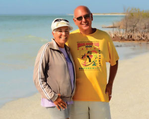 Photo: Elizabeth Kraker  Margaret and Steve Santangelo spend their winters in Tierra Verde so they can be close to the natural beauty of Fort DeSoto beach.  