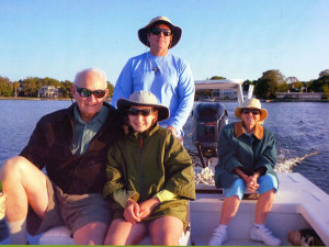 Left to right, Jan's husband, Bill, her son, Kevin, and his wife, Emma, with Jan in the back of the boat. Photo courtesy Jan Platt.