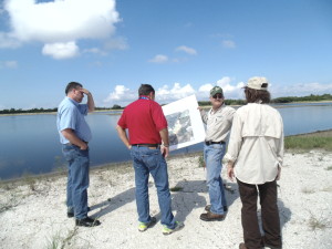 SWIM scientist Brandt Henningson (facing the camera) shows how the restoration was planned and implemented.