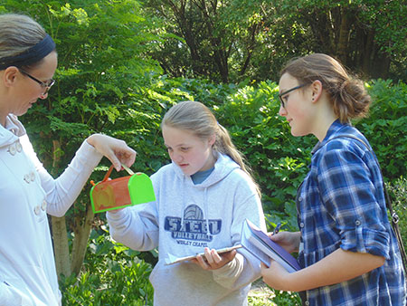 Anna Slean (left) and Helena Rodriguez covered the BioBlitz for Bay Soundings, talking to both experts and students about what they learned about biodiversity on their school campus.
